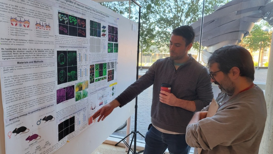 Mark Verba presenting research at a graduate symposium